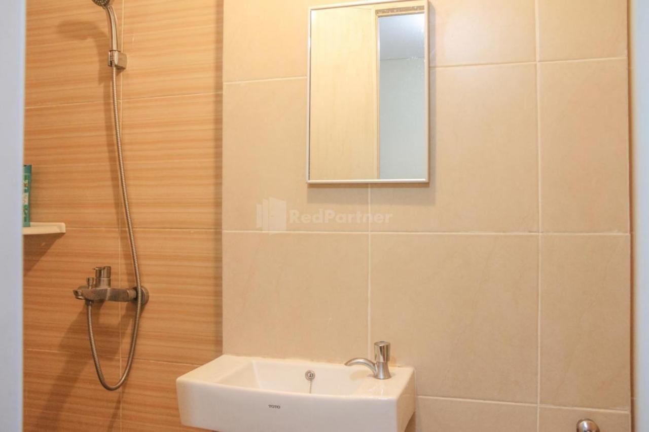Hotel Redliving Paradise Mansion - Gunawan